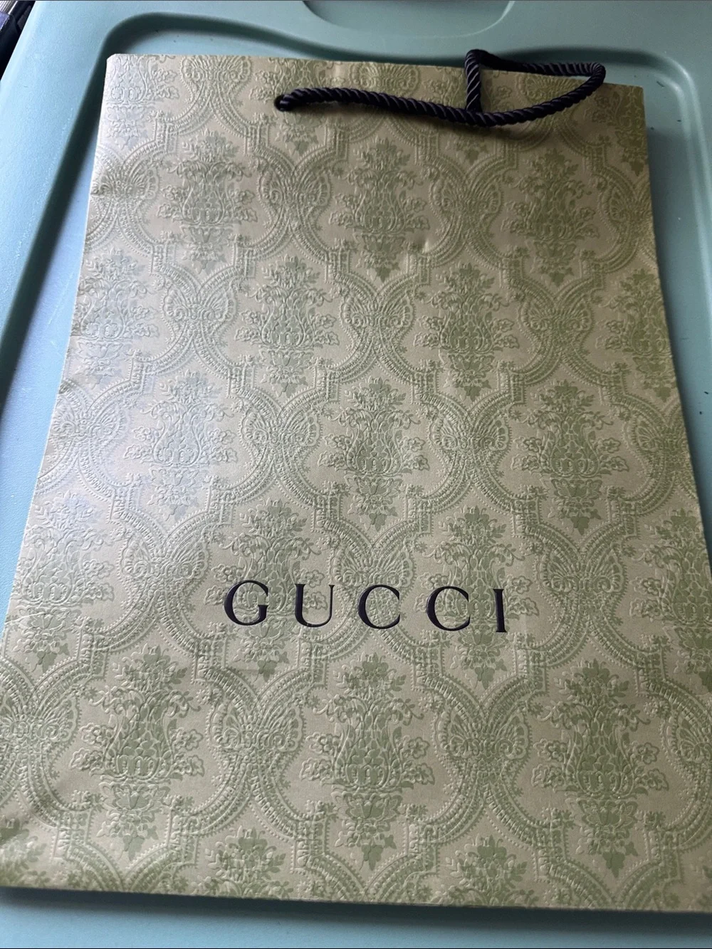 Gucci Light Green Embossed Logo Shopping Bag with Black Rope Handles
